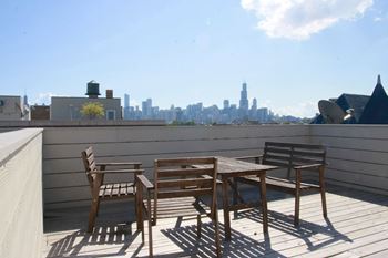Shared roof deck with city views